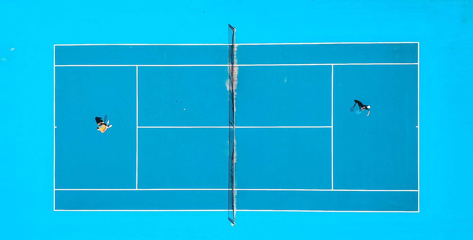 Father-Son Tennis. Photo by Lucas Davies.